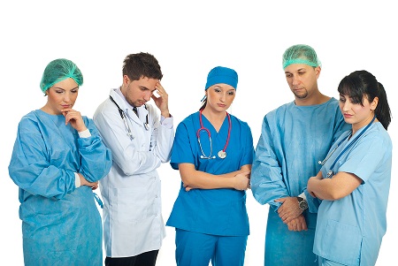Sad doctors team